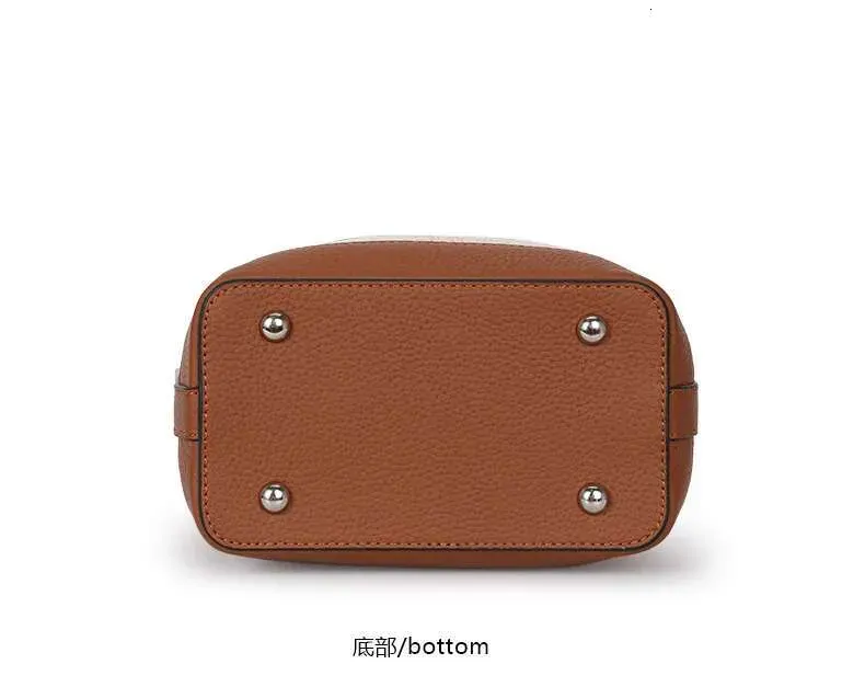 Nuova borsa a tracolla da donna in tela abbinata a pelle di mucca, borsa a secchiello alla moda con motivo scozzese_voghion.com