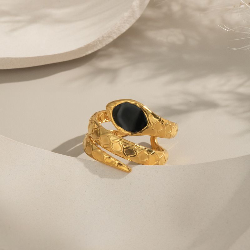 XIANING Minimalistischer, geschwungener Ring aus Edelstahl mit geometrischem Design für Damen in Goldfarbe – Einzigartiges Schmuckstück für jeden Tag_voghion.com