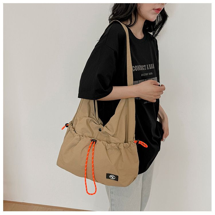 Unisex Lazy Style Große Kapazität Lässiger Sportrucksack Crossbody Kordelzug Design Einfache Textur Umhängetasche_voghion.com