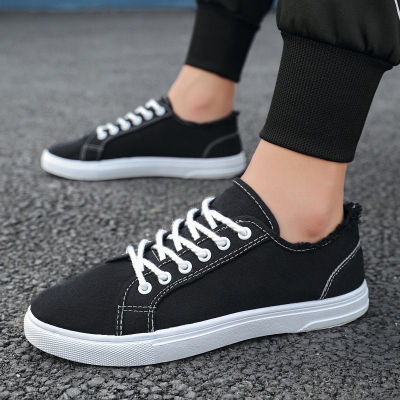 Scarpe da uomo in tela, scarpe bianche basse con suola morbida, alla moda e casual, con un solo piede, versione coreana per studenti, alla moda._voghion.com