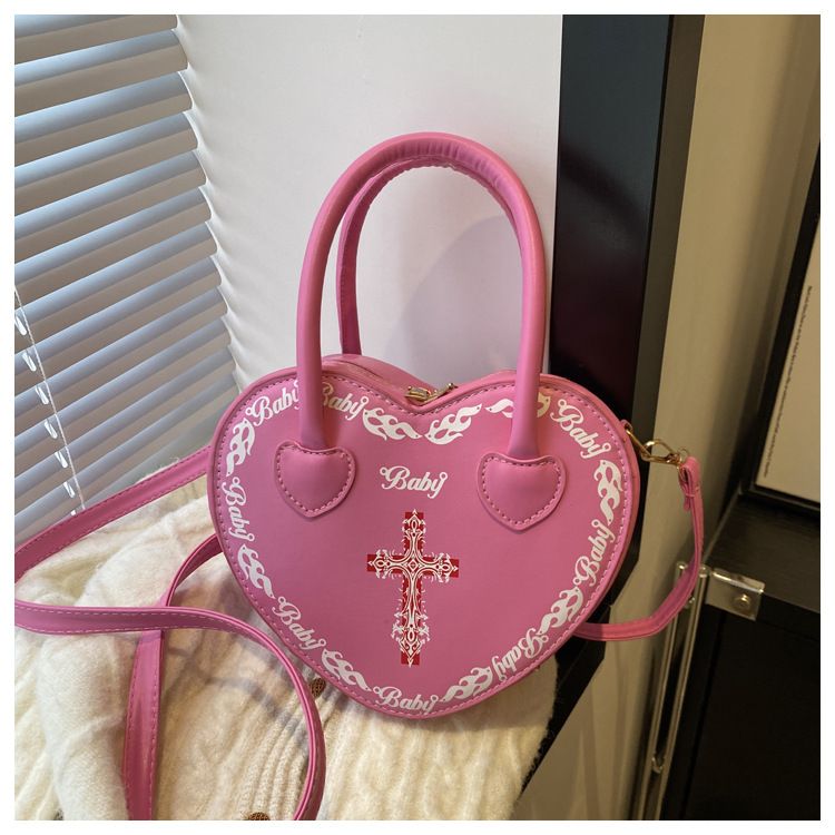 Borsa da donna personalizzata Rivet Punk Dark 2024 Nuova borsa a forma di cuore, borsa a tracolla incrociata, borsa a tracolla per donna_voghion.com