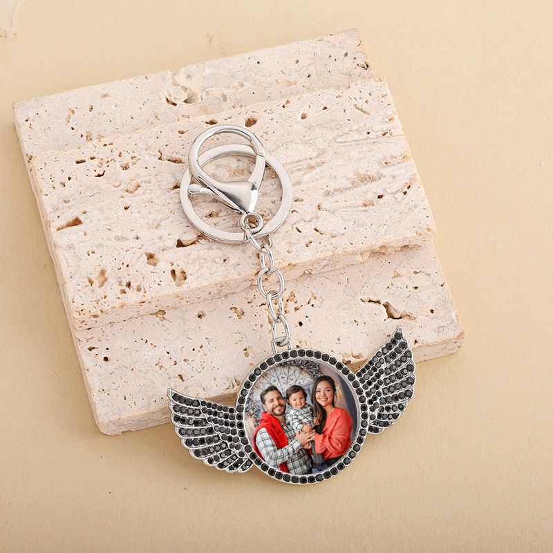 Portachiavi alla moda in stile hip hop con ala e strass: accessorio fai da te unico per uomini e donne (argento, diamante nero/rosa/bianco/blu)_voghion.com