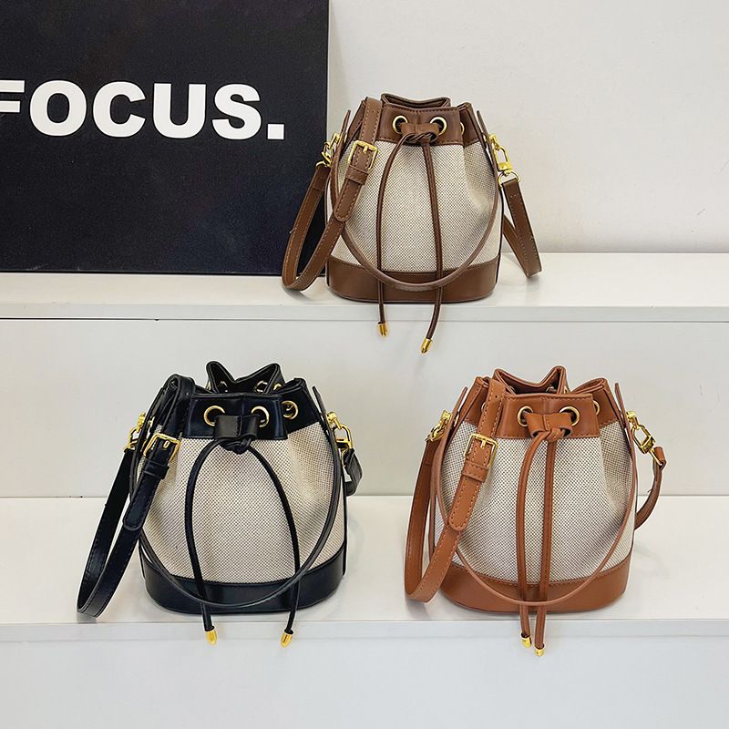 Borsa a secchiello con tracolla e coulisse da donna, borsa a mano color block_voghion.com