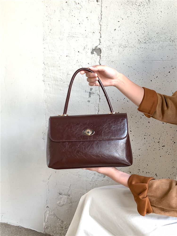 Borsa a tracolla con patta a forma di nicchia, moda di alta gamma, stile minimalista e compatto_voghion.com