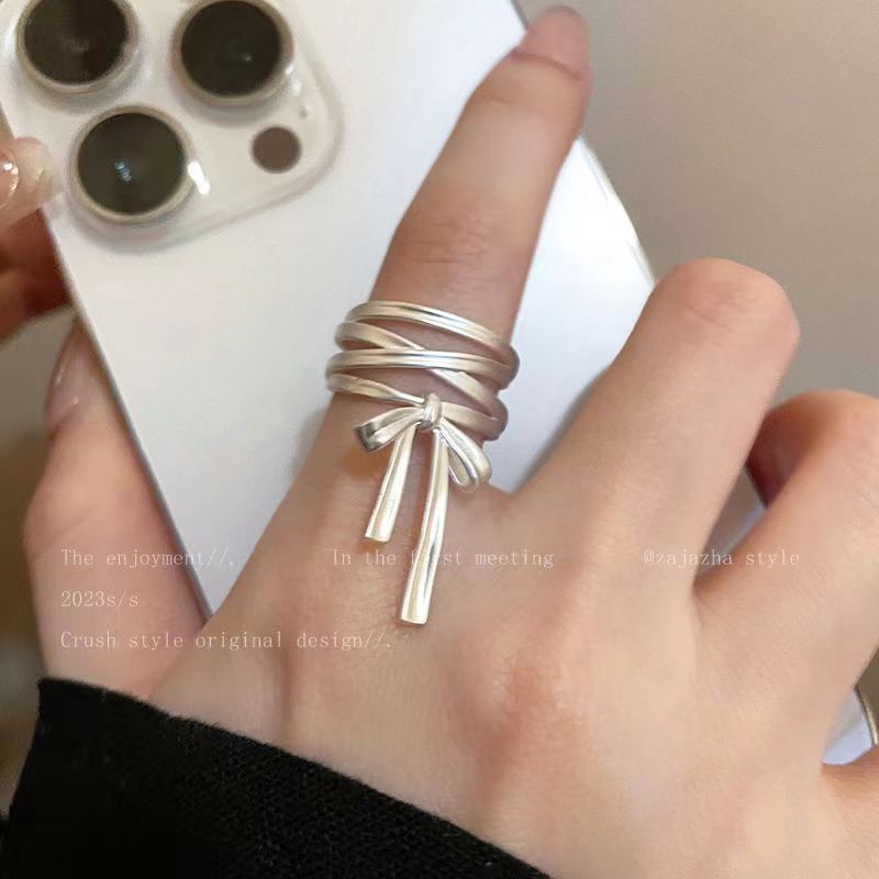 Kall distanserad fransk rosett och bandöppning, kvinnlig nischdesign med avancerad justerbar pekfingerring, unik_voghion.com