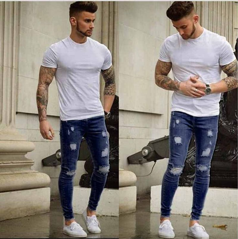 Wholesale of new white worn slim jeans for men in Europe and America_voghion.com