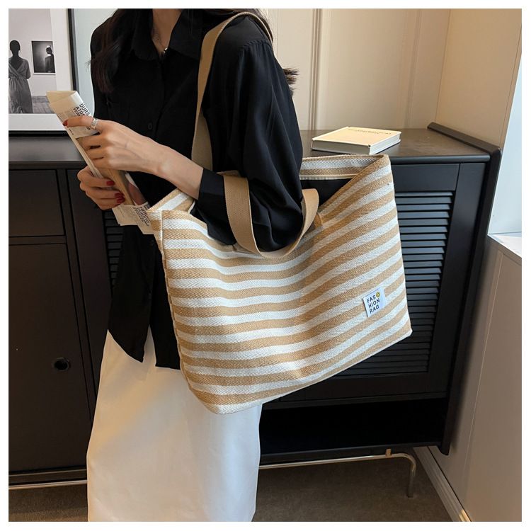 2024 New Spring/summer Popular Simple Shoulder Bag Commuter Handheld Canvas Tote Bag Casual Large Capacity Bag for Women_voghion.com