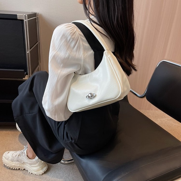 Lai Daqian 2023 Zomer Nieuwe Stedelijke Eenvoudige Bagage Lederen Schoudertas PU auto stiksels dames schoudertas_voghion.com