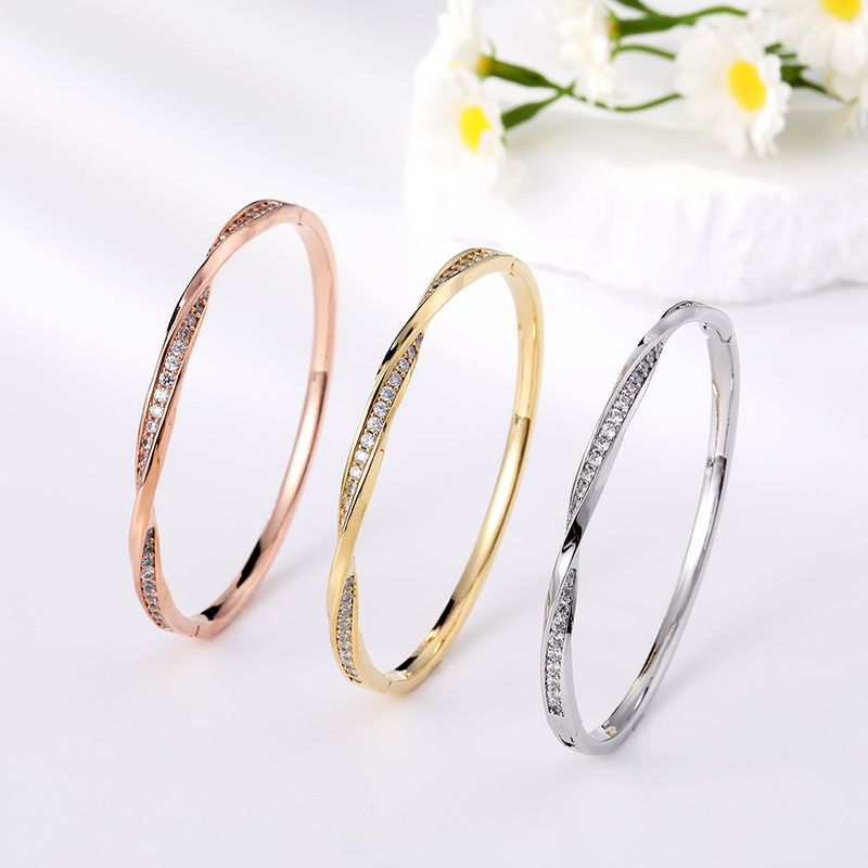 Damenschmuck Gedrehtes Spiralwellenarmband für Mädchen High-End-Stapelarmband Nischendesign Armband mit hoher Farbkonservierung_voghion.com
