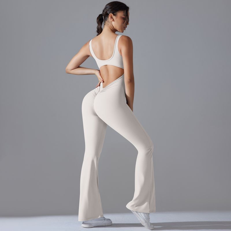 Neuer, einfarbiger, hüfthebender, langer, schmal geschnittener Jumpsuit mit weitem Bein für Sport, Laufen, Fitness und Yoga_voghion.com