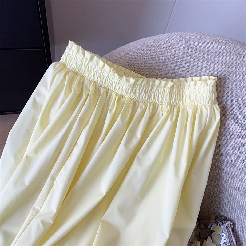 Gonna gialla da donna, a vita alta, a trapezio, sottile, di media lunghezza, con grande gonna a ombrello._voghion.com