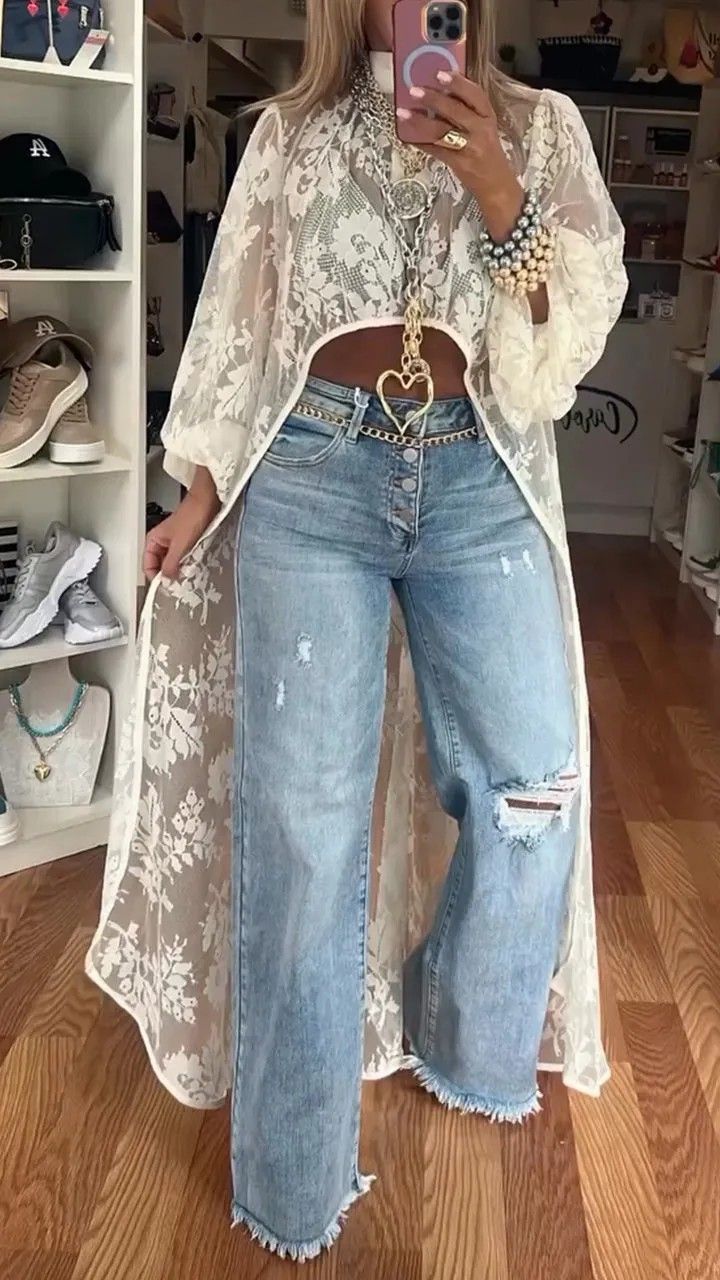 Abbigliamento da donna, top trasparente lungo corto posteriore, in pizzo floreale davanti_voghion.com