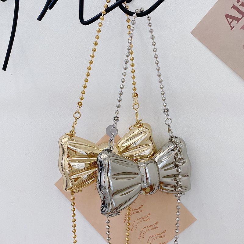 Bolso bandolera mini de estilo coreano con lazo y cadena metálica de diseño exclusivo. Un accesorio versátil para mujer._voghion.com