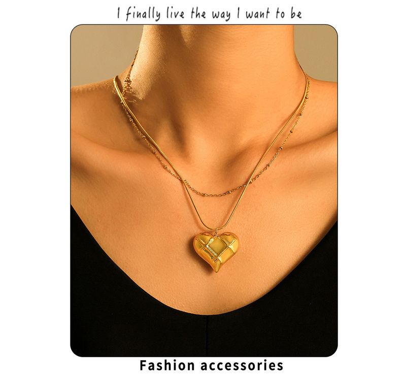 Hollow Plaid Heart-shaped Pendant Necklace Made Of Stainless Steel PVD Vacuum Layered, High-end Clavicle Chain_voghion.com