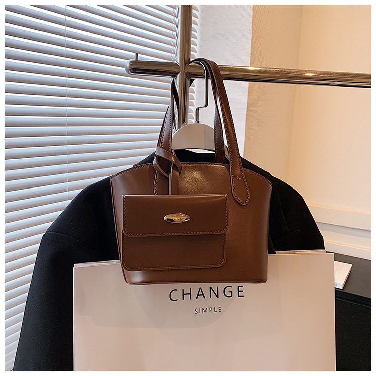 Borsa piccola portatile di moda estiva nuova borsa a secchiello casual semplice da donna 2023 borsa per ascelle suocera con trama di nicchia_voghion.com