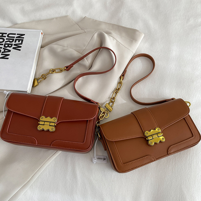 Borsa da donna di Nanfeng 2023 Primavera ed estate Nuovo design di nicchia La sensazione di vera pelle è popolare quest'anno consegna di borse quadrate in vera pelle sotto le ascelle_voghion.com