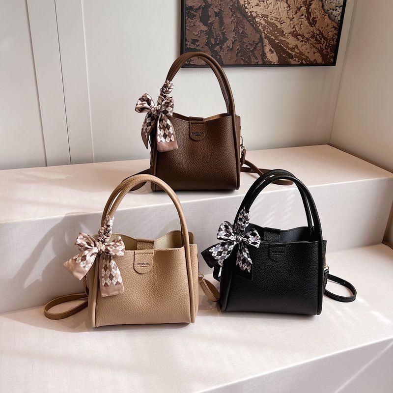Borsa a mano per donna 2025 Nuova borsa a secchiello di nicchia, versatile, a tracolla, alla moda, da donna._voghion.com
