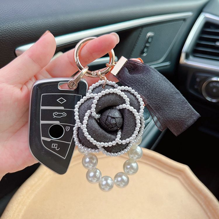 Personalized pearl element camellia lace simple women's bag pendant keychain Korean version_voghion.com
