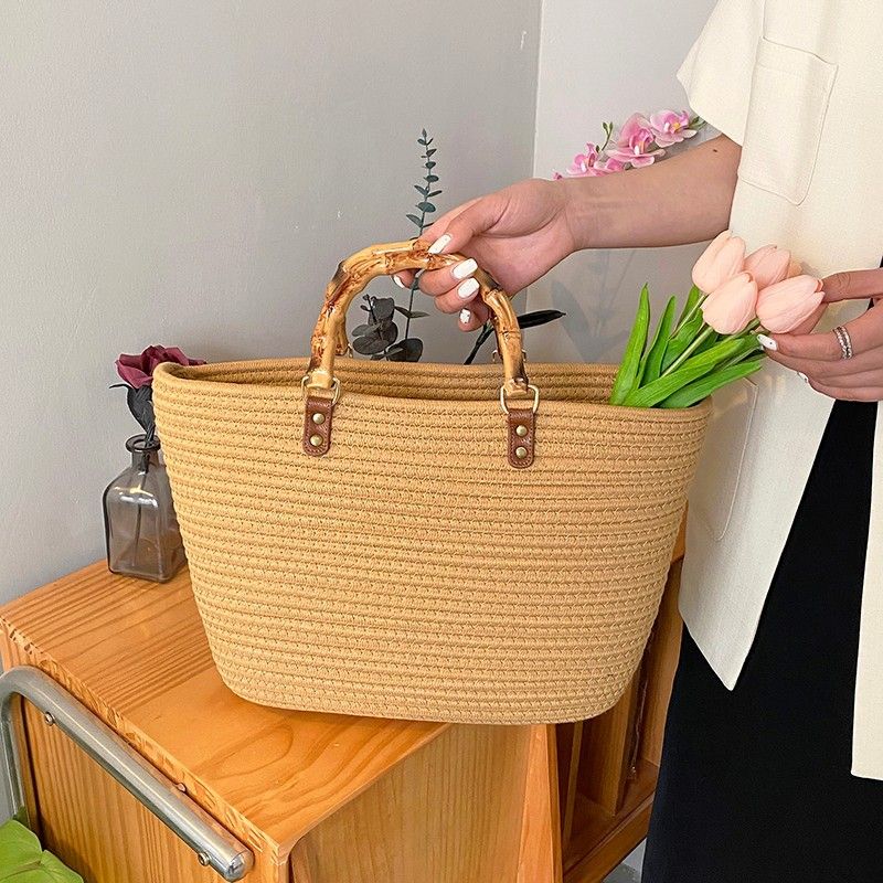 Gestreifte große Kapazität Stroh Persönlichkeit Casual Urlaub Strand Frauen Nischendesign Bambus Griff Tasche Taschen_voghion.com