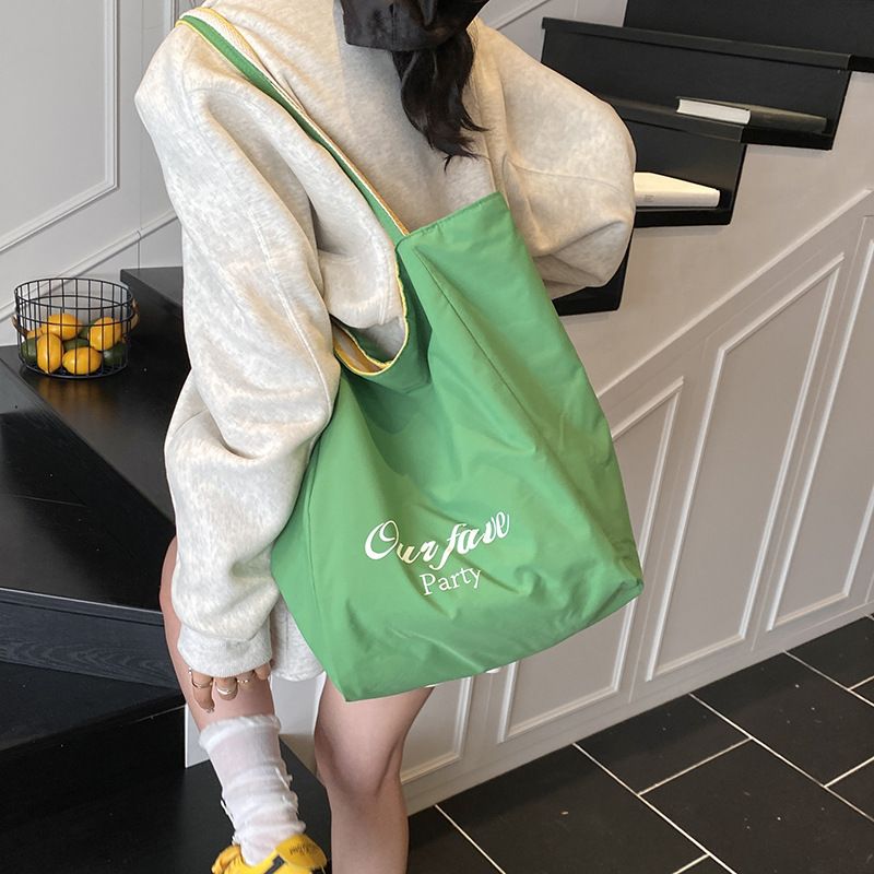 Borse a tracolla da donna: una borsa tote casual a righe con blocchi di colore, dallo stile dolce e rilassato, borsa a tracolla singola bifacciale_voghion.com