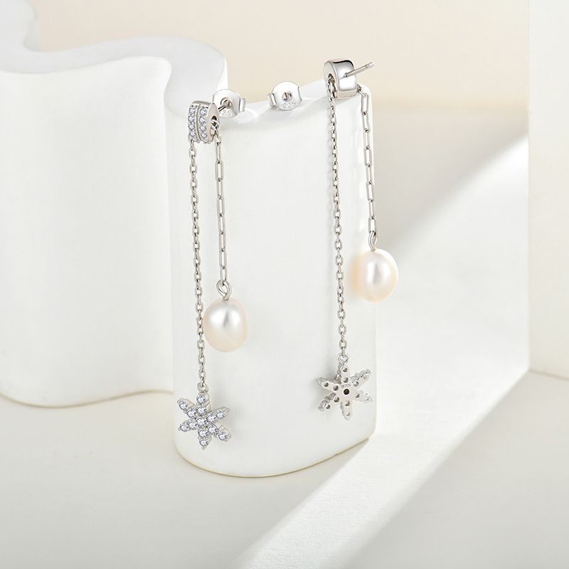 orecchini in argento a sei punte con zirconi a forma di stella_voghion.com