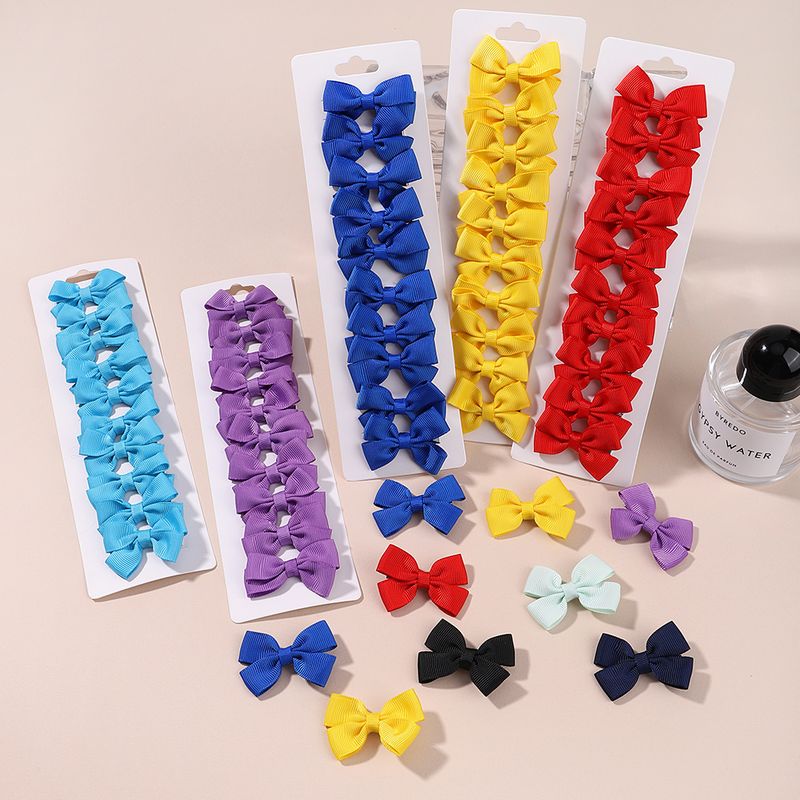 30 pezzi Mini colori casuali Dolce nastro farfalla nodo fermaglio per capelli Carino clip laterale frangia morsetto semplice accessorio per capelli nodo farfalla_voghion.com