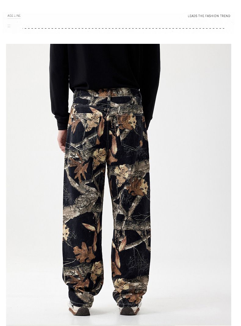 Herrkläder populära lösa raka breda ben jeanstryck graffiti svarta grenar och fallna löv mode street jeans för män_voghion.com