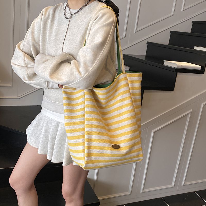 Borse a tracolla da donna: una borsa tote casual a righe con blocchi di colore, dallo stile dolce e rilassato, borsa a tracolla singola bifacciale_voghion.com
