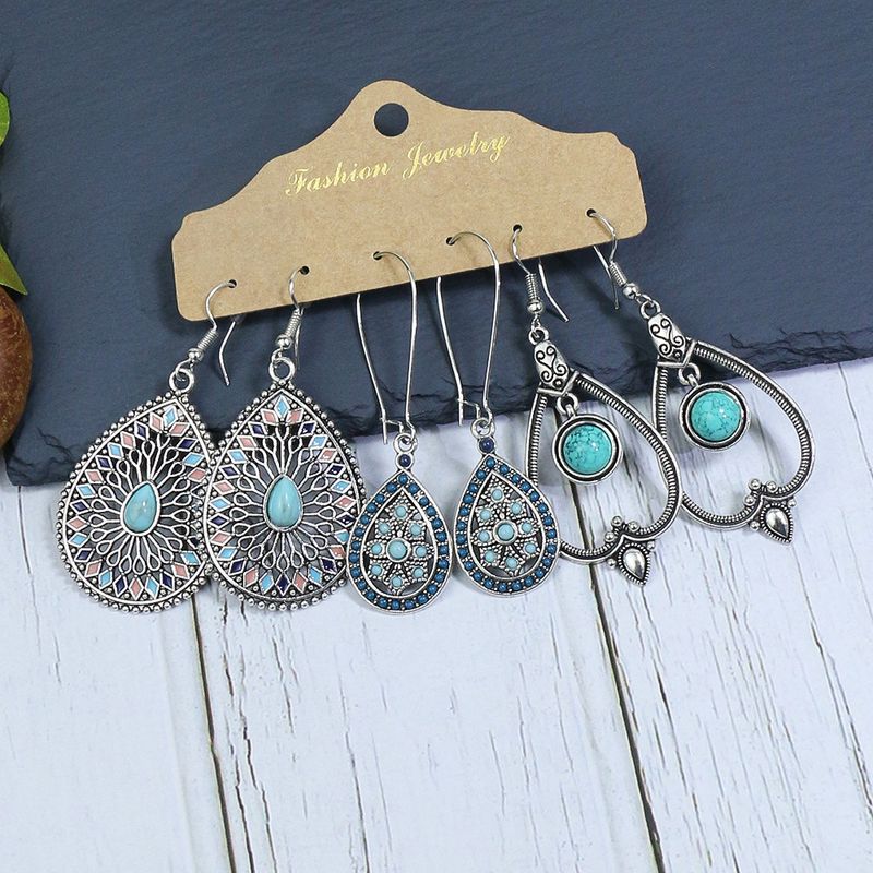 Earrings Fashion Exotic Eyes Beaded Tassel Earrings Hollow Drop-shaped Turquoise Diamond Earrings Set_voghion.com