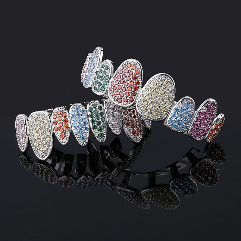 Vanzare fierbinte Zircon complet cu opt dinti incrustat Bretele din zircon Hip Hop Personalitate neregulata Bretele din aur_voghion.com