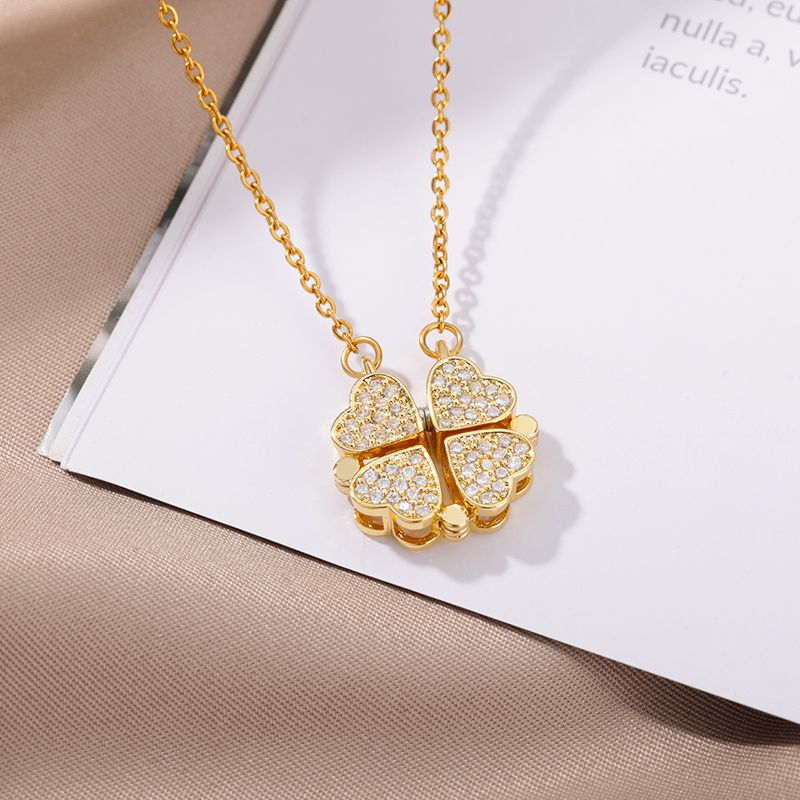 2025 Nuovi arrivi Collana con ciondolo a forma di cuore a quadrifoglio magnetico per donna Catene lunghe in acciaio inossidabile Collane Gioielli estetici fortunati_voghion.com