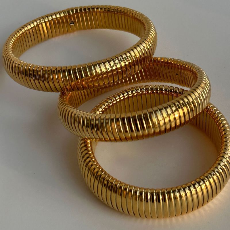 Bracciale Gypsy elastico in acciaio al titanio placcato oro vero_voghion.com