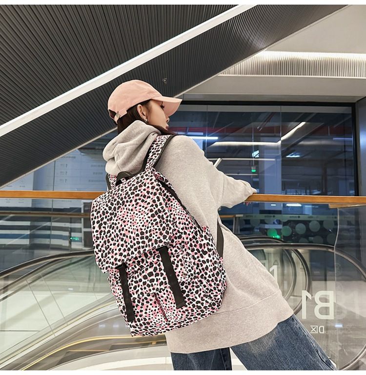Fashionable large capacity high aesthetic value backpack with waterproof and versatile casual flip design, original_voghion.com