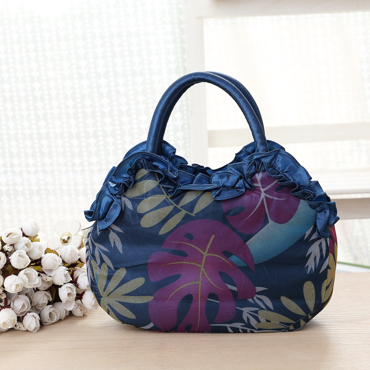Mittelgroße neue Schlüsseltasche für Damen, koreanische Version der Damenhandtasche, einfarbige Damenhandtasche mit Reißverschluss aus Spitze._voghion.com