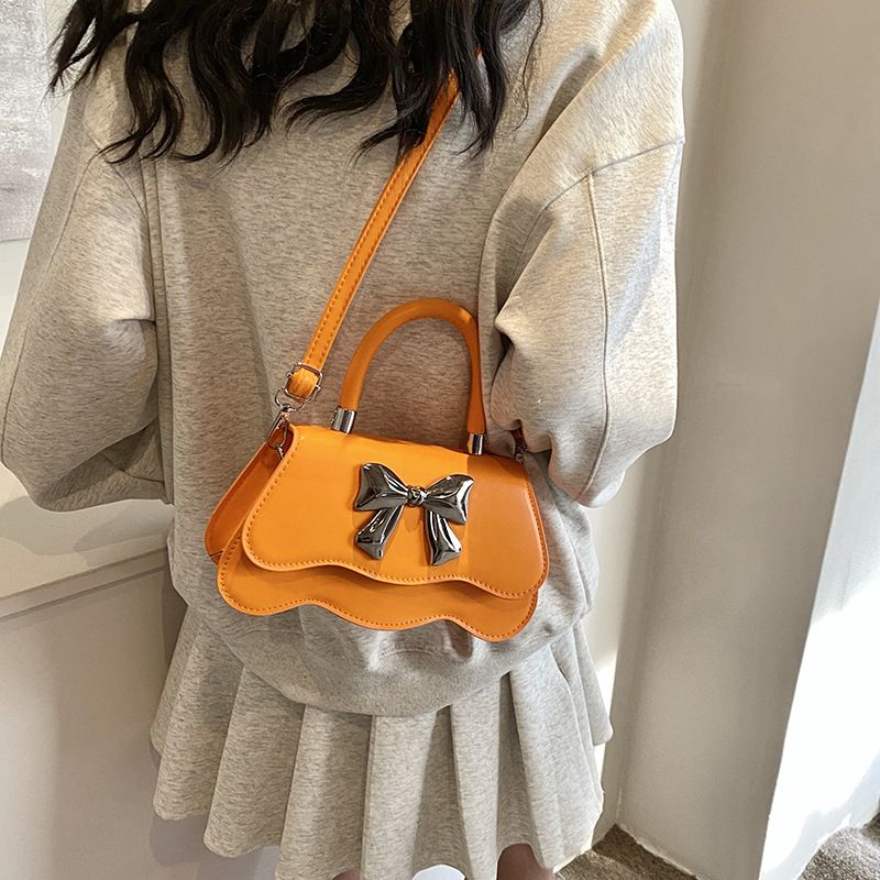 Borsa a tracolla singola con design di nicchia, semplice ed elegante, con fiocco, per donna, nuova borsa a tracolla primavera estate 2024_voghion.com