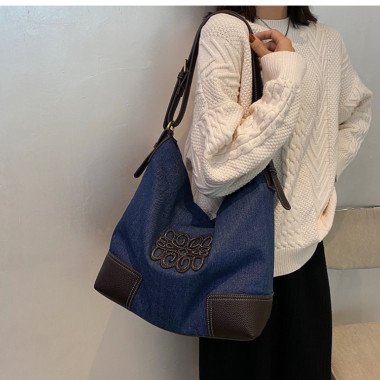 2024 Nuova borsa da donna di grande capacità Borsa da donna autunnale Borsa in tela Instagram Borsa a tracolla singola Borsa a secchiello casual_voghion.com