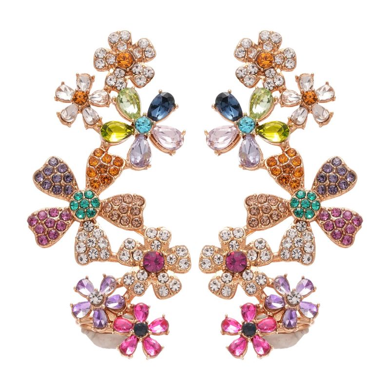 Orecchini a clip con fiore in argento placcato oro vero, luce integrata, lusso, alta moda, nicchia_voghion.com