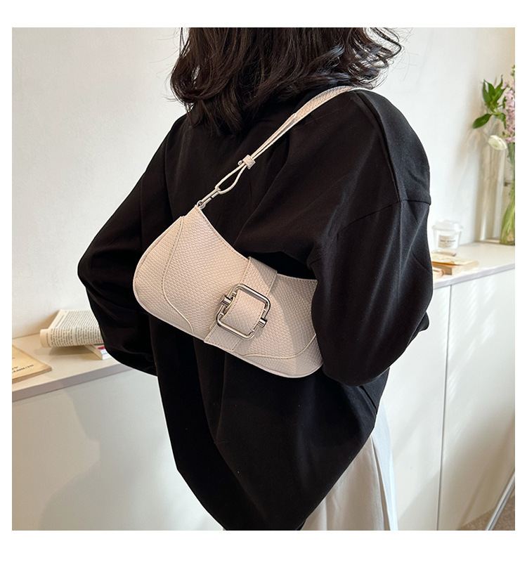 Französische Nischen-Design-Tasche, einfache Umhängetasche mit Schlangenledermuster, Pendler-Mode, Nischen-Baguette-Halbmond-Tasche, Unterarmtasche_voghion.com