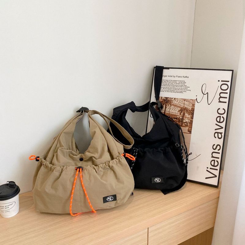 Unisex Lazy Style Große Kapazität Lässiger Sportrucksack Crossbody Kordelzug Design Einfache Textur Umhängetasche_voghion.com
