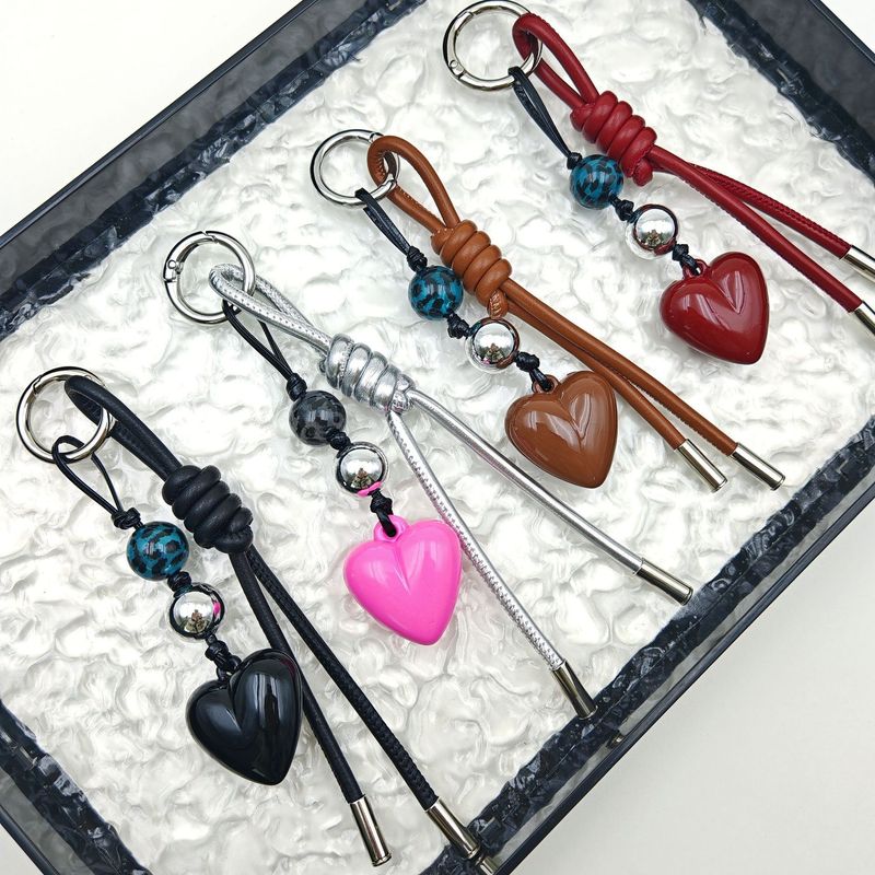 Ciondolo per borsa, semplice e creativo, nuovo portachiavi a forma di cuore in corda di pelle intrecciata_voghion.com
