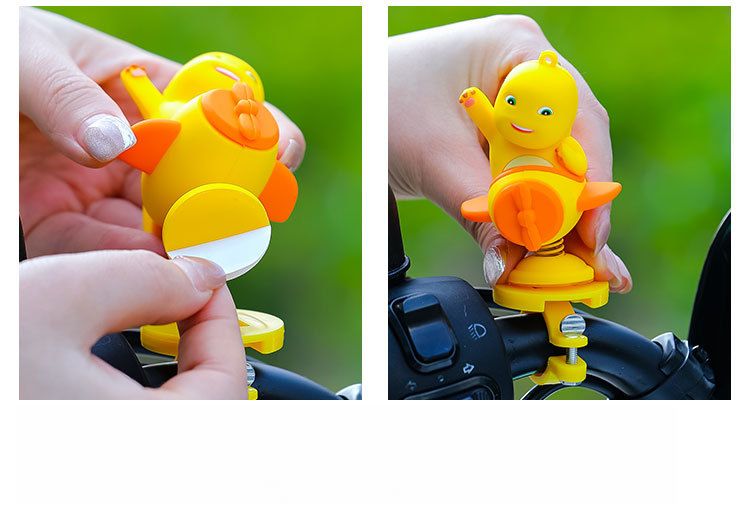 2025 New Genuine Milk Dragon Electric Car Ornament Rocking Cartoon Doll Summer Riding Bicycle Decoration_voghion.com