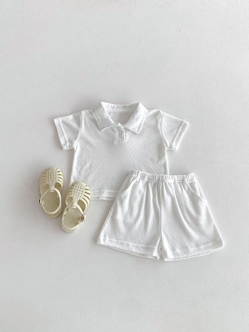 I pantaloncini a maniche corte per neonati e bambini per mamma e bambino si adattano a vestiti striscianti a triangolo cavo semplici e comodi per uscire_voghion.com