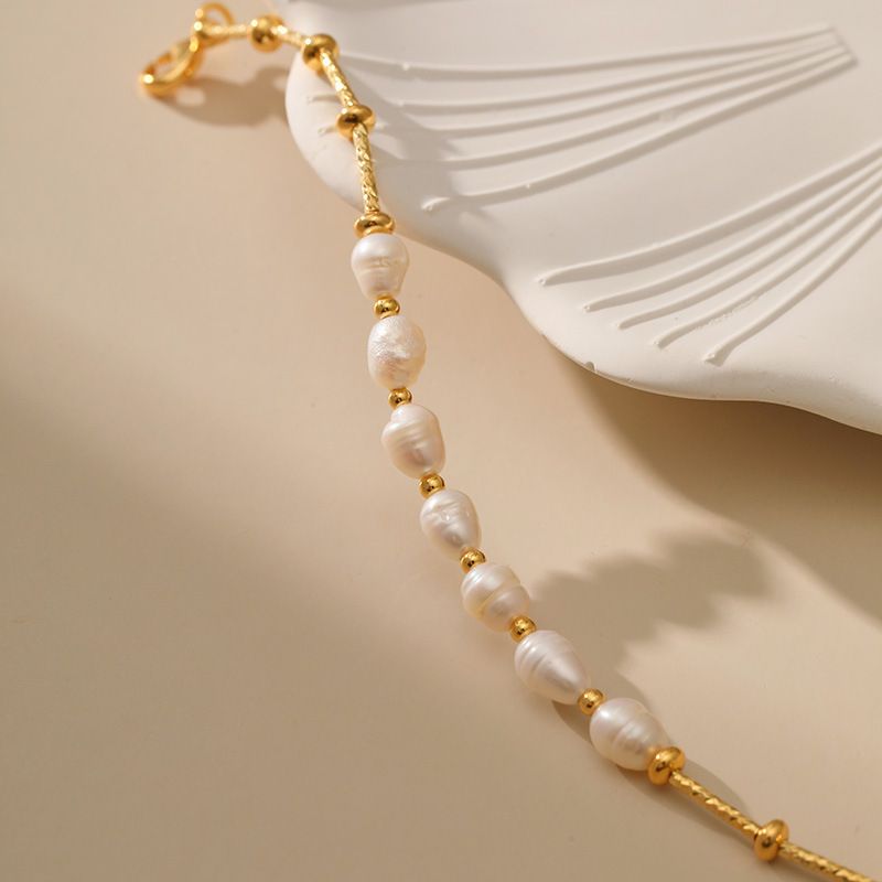 Copper plated K gold natural freshwater pearl gold round bead copper chain design is not easy to allergic elegant texture women's bracelet_voghion.com