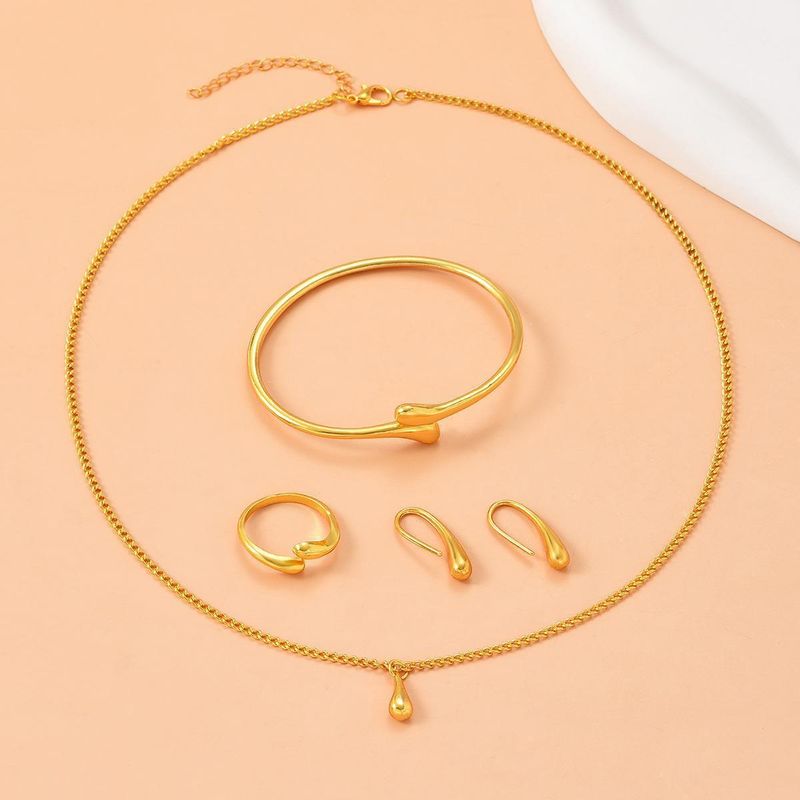 Conjunto de quatro peças de colar gota d'água, moda diária simples, conjunto de colar, brincos, anel e pulseira_voghion.com