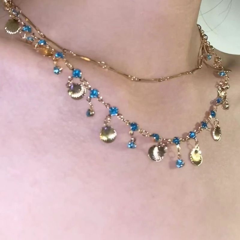 Blaue Muschelhalskette, weiblicher Choker, doppellagig gestapelt, trägt eine exquisite High-End-Nische mit Schlüsselbeinkette_voghion.com