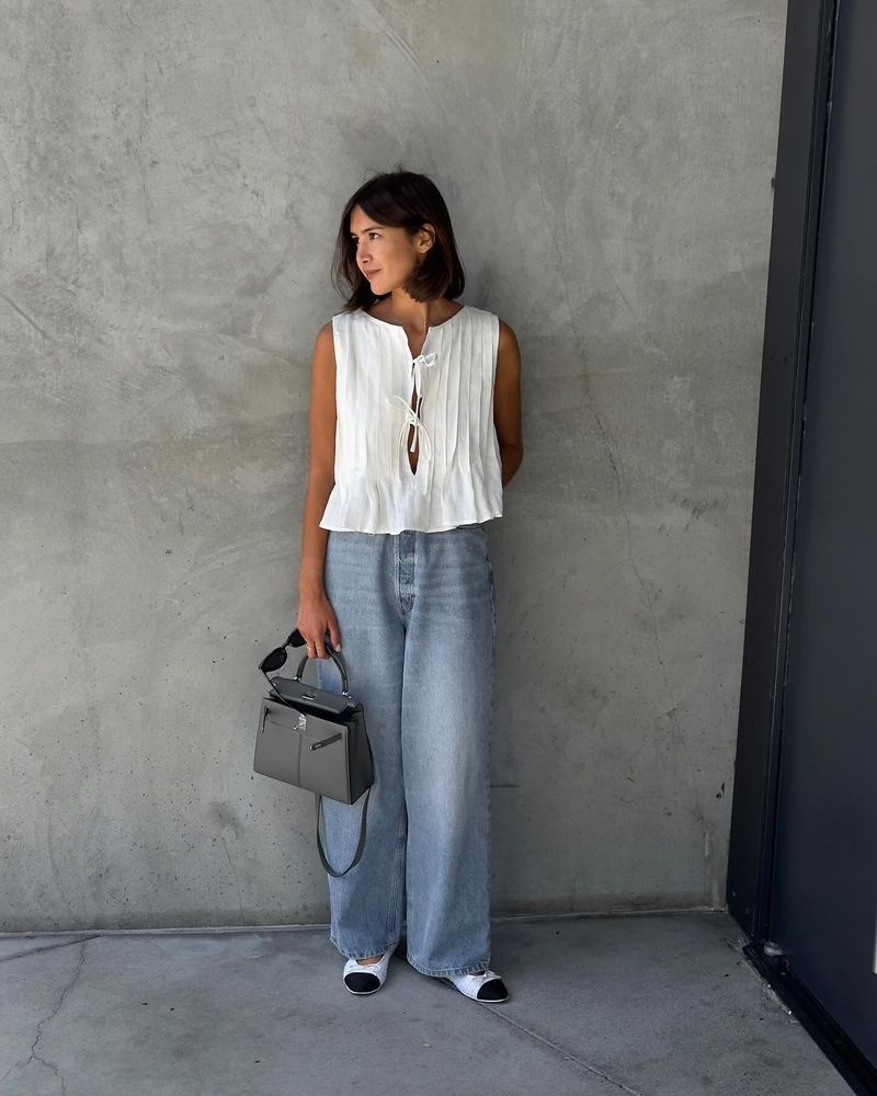 Completo da donna europeo e americano, primavera ed estate 2025, in cotone e lino, senza maniche, due pezzi, con camicia e gonna lunga da donna con spalline sottili._voghion.com