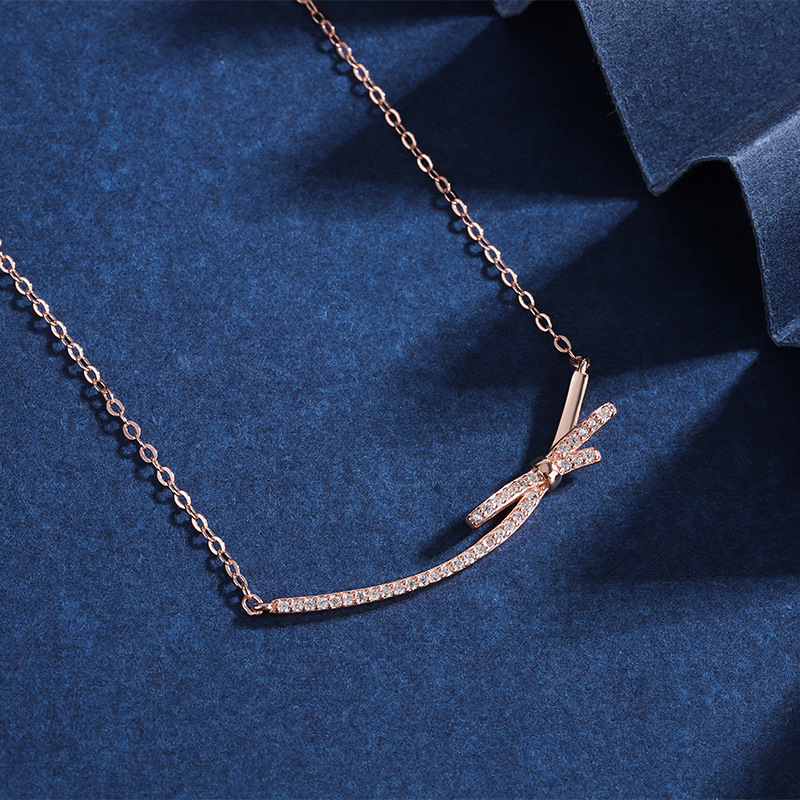 Collana di design con zirconi intarsiati con nodo a fiocco per donna, design leggero, lussuoso, piccolo e popolare come regalo per la fidanzata_voghion.com