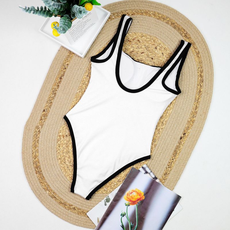 Maillot de bain une pièce noir et blanc pour femme, style simple et haut de gamme, avec petit parfum et boutons décoratifs_voghion.com