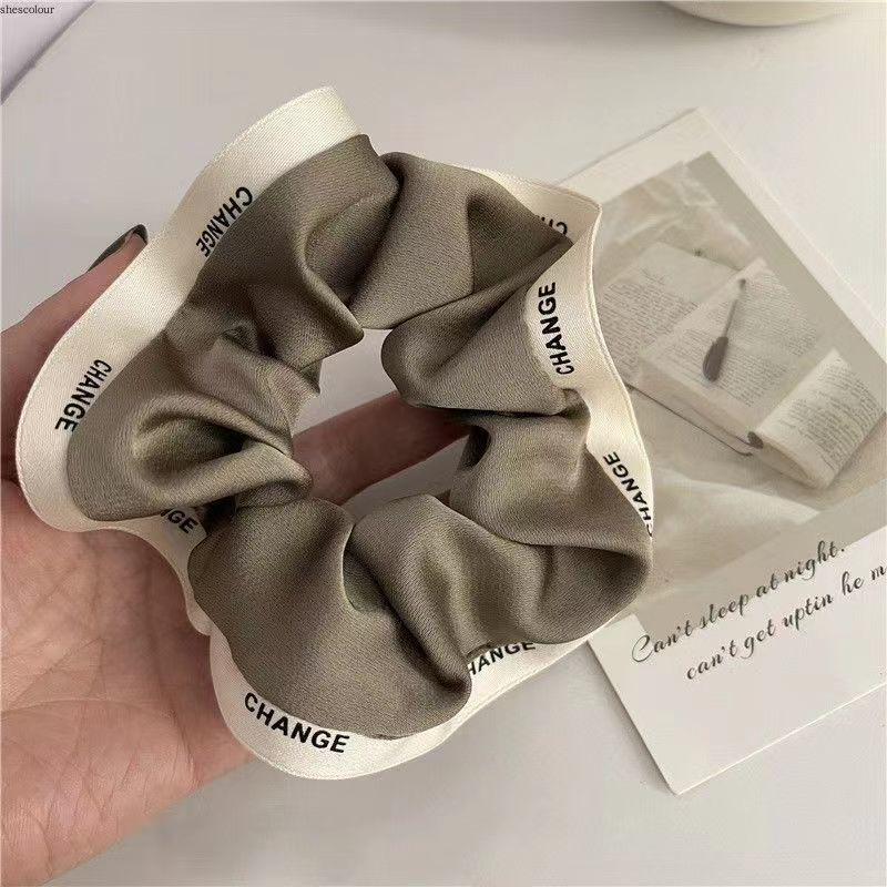 Anello per capelli dell'intestino crasso Semplice coda di cavallo in tessuto coreano di fascia alta Anello per capelli con bordo pressato in stile francese Instagram_voghion.com