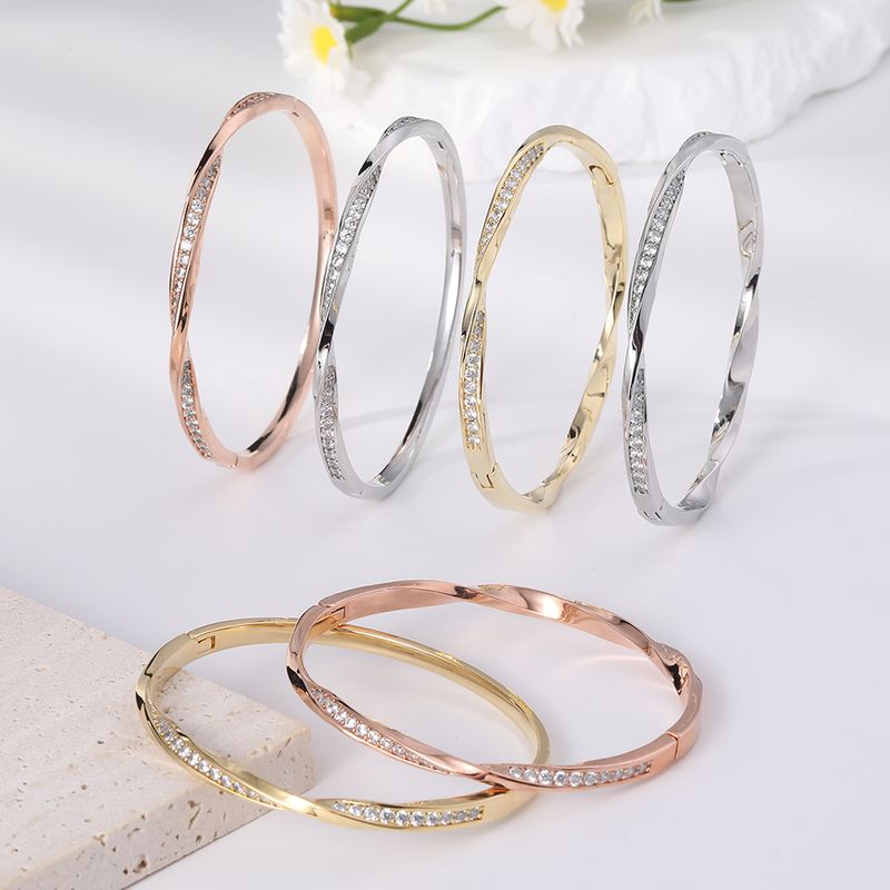 Damenschmuck Gedrehtes Spiralwellenarmband für Mädchen High-End-Stapelarmband Nischendesign Armband mit hoher Farbkonservierung_voghion.com